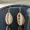 Boucles doreilles en cauris court